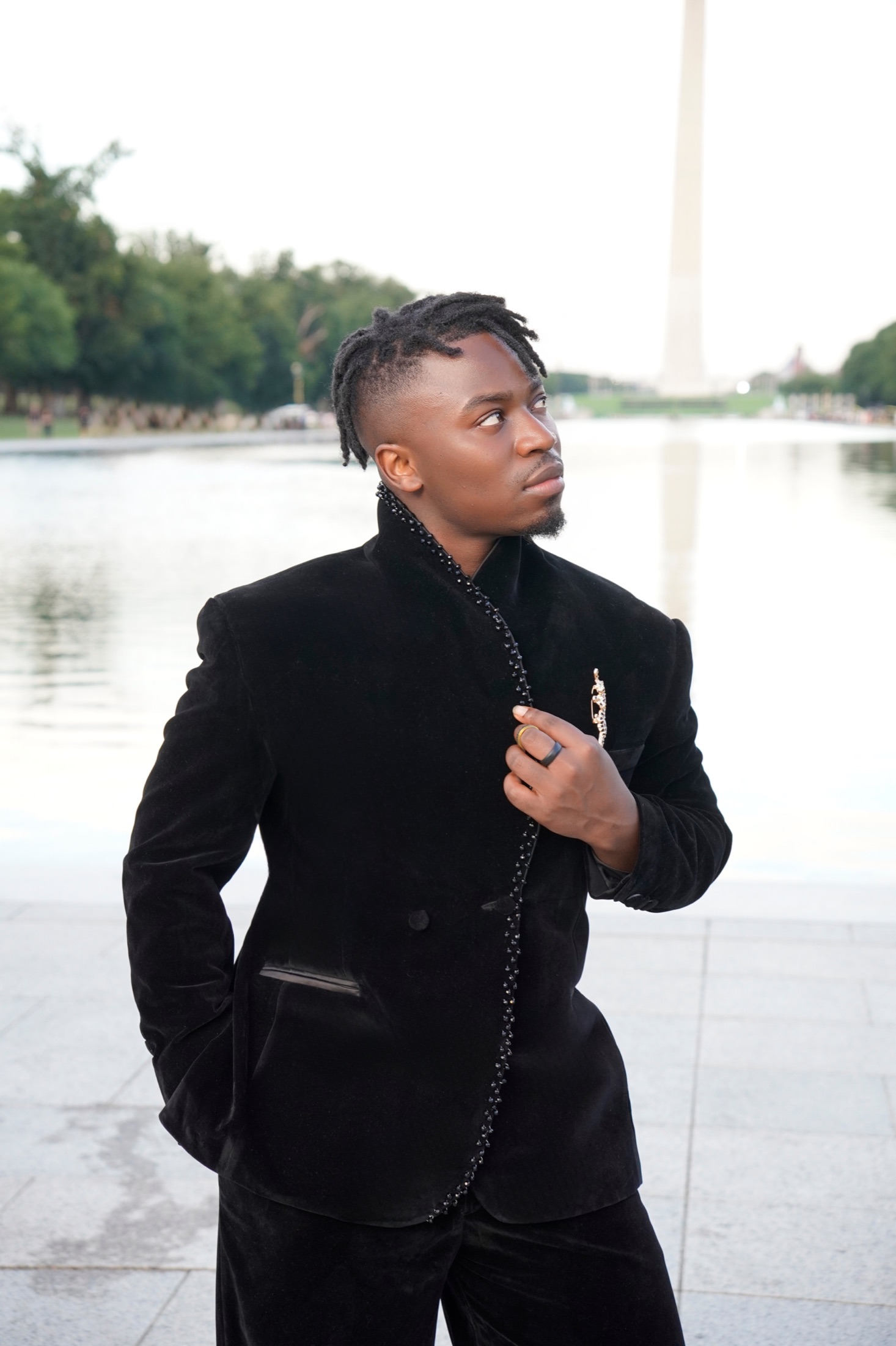 Close portrait in black velvet with the Washington Monument behind